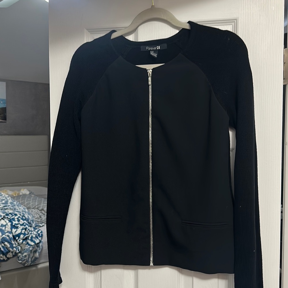 Like new Forever 21 black cardigan with zipper. Size M.